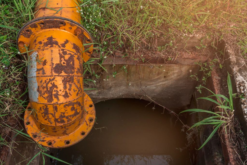 Sewage backup in yard requiring professional sewage cleanup service in Vancouver WA